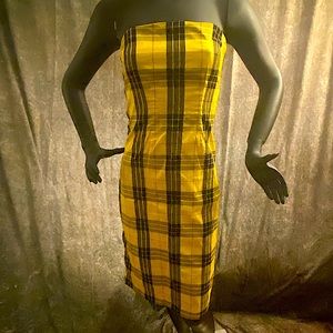 Strapless, yellow/black striped midi dress with black satin lining and zipper.